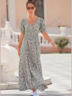 Robe longue encolure v imprimé discret et manches bouffantes