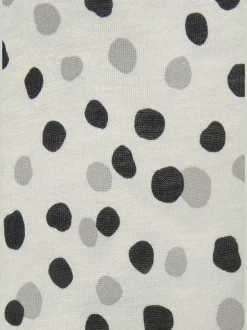 Robe longue fines bretelles spaghetti avec motifs à pois