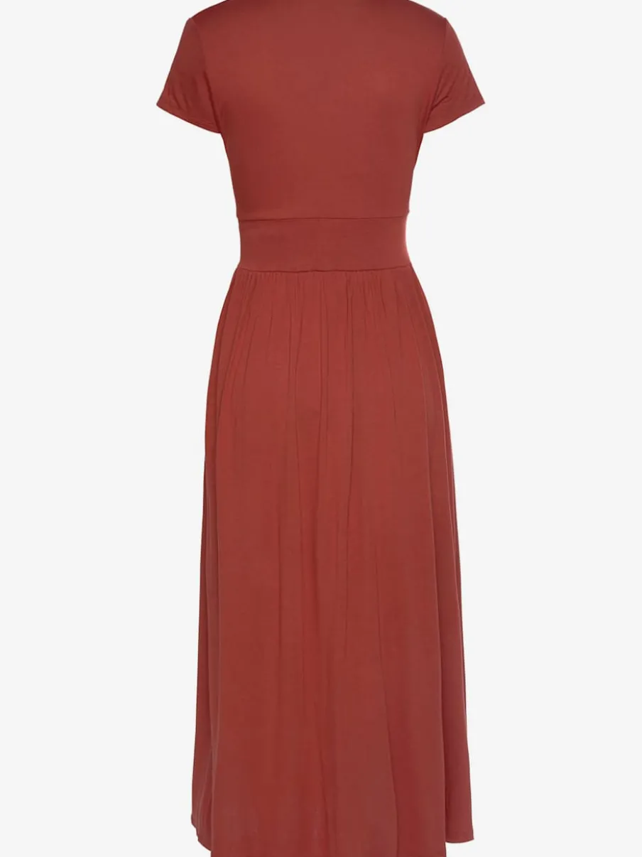 Robe midi à encolure avec glissière et empiècement.