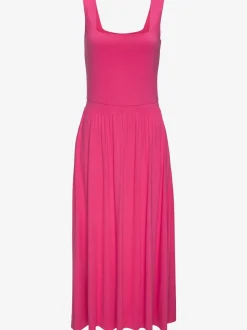Robe mi-longue en jersey avec encolure droite et poches