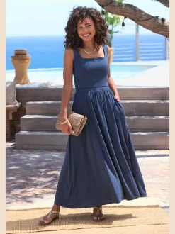 Robe mi-longue en jersey avec encolure droite et poches