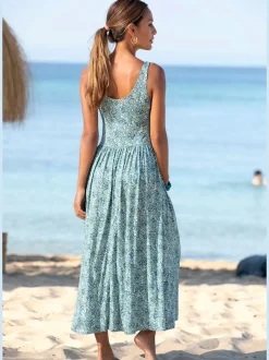 Robe mi-longue à larges bretelles avec décolleté dos