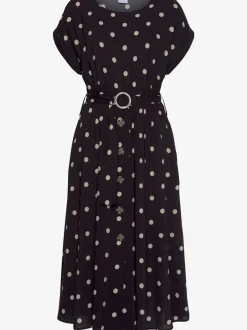 Robe mi-longue à pois avec ceinture et poches latérales
