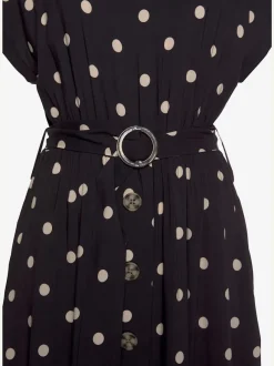 Robe mi-longue à pois avec ceinture et poches latérales