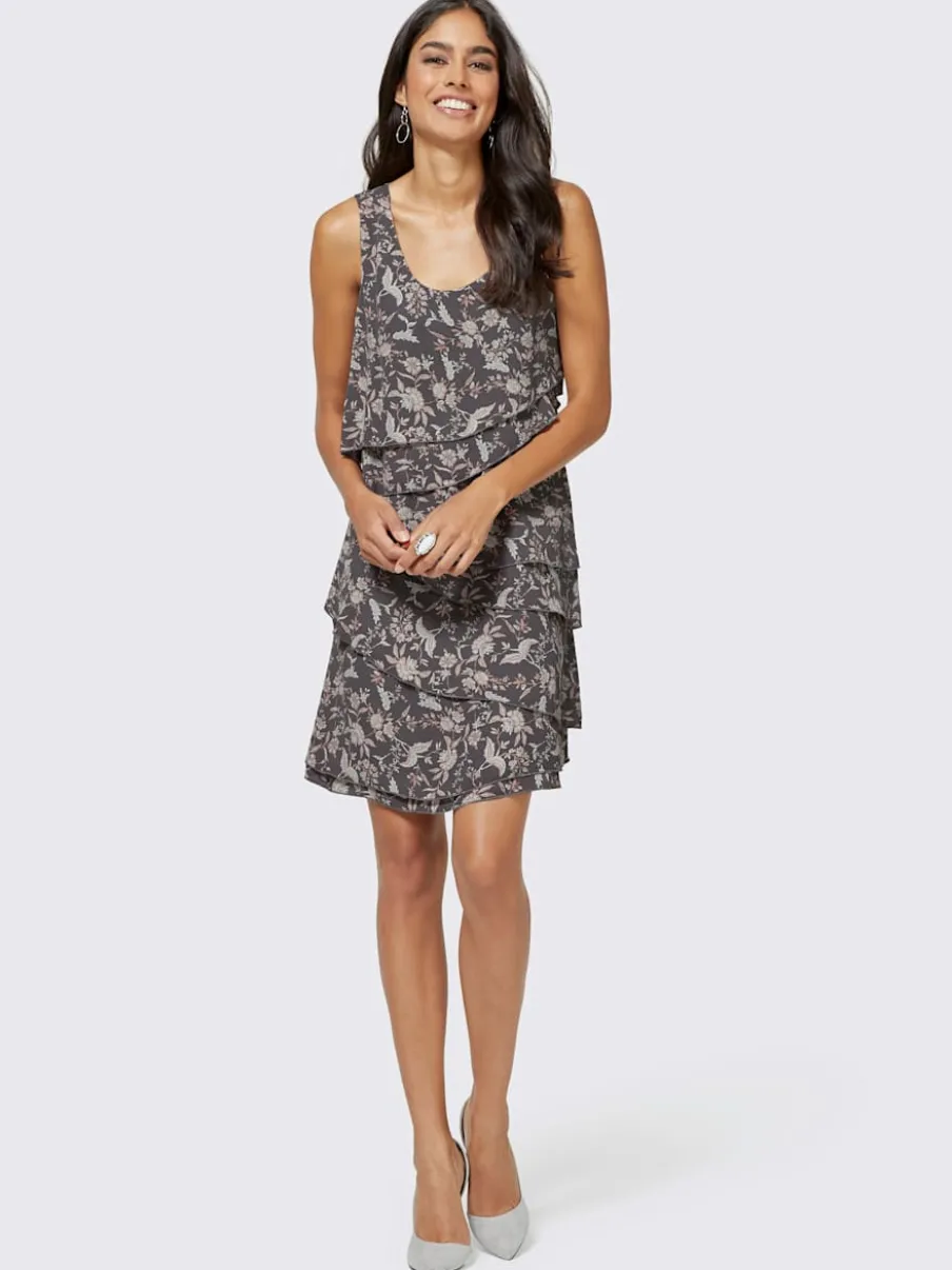 Robe à motif floral avec coupe superposée et manches sans manches