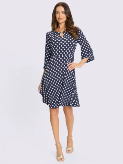 Robe à pois avec col rond et manches évasées