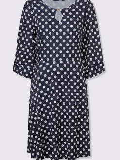 Robe à pois avec col rond et manches évasées