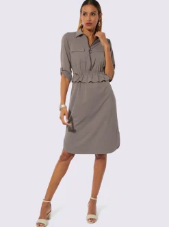 Robe polo à manches 3/4 avec poches et glissière