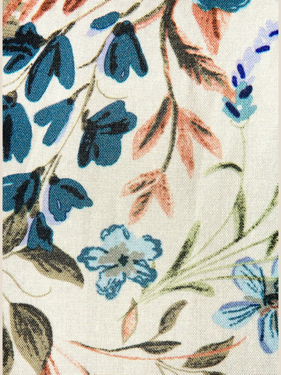 Robe tunique à encolure en V avec décoration raffinée