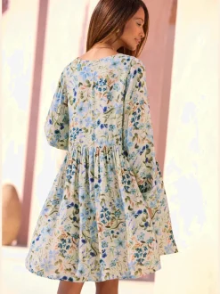 Robe tunique à encolure en V avec décoration raffinée