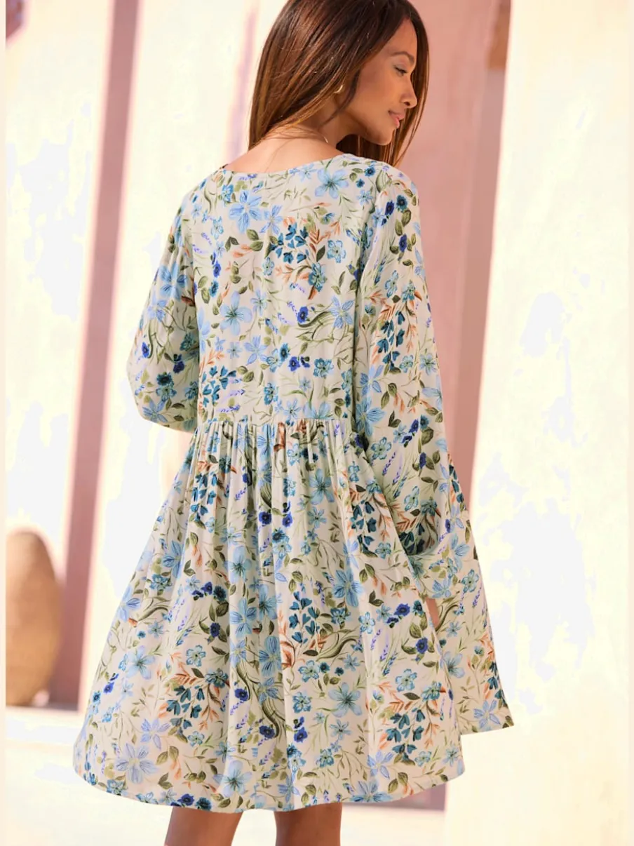 Robe tunique à encolure en V avec décoration raffinée