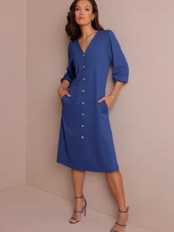 Robe évasée en mélange soie-viscose avec col V et manches ballon