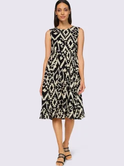 Robe évasée sans manches avec imprimé ethnique en tissu fluide
