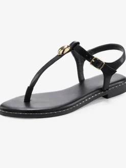 Sandales élégantes avec rivets dorés