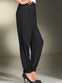 Sarouels fluides avec taille élastique et poches arrondies