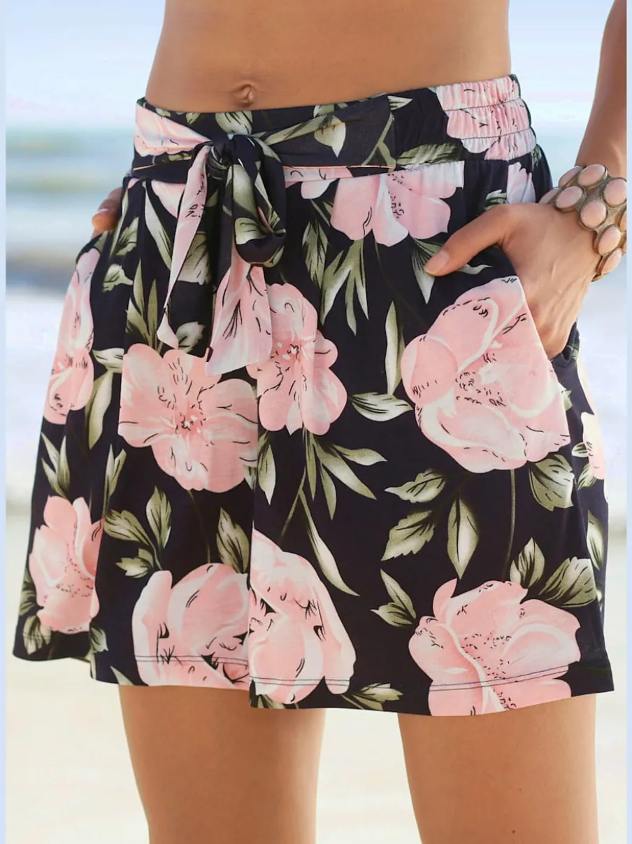 Short ample à ceinture élastique avec liens à nouer et motifs floraux