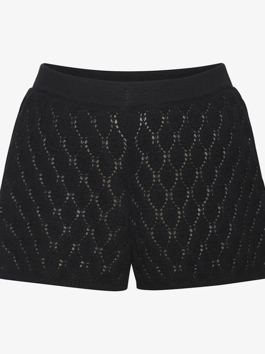 Short de plage en tricot à manches larges et motifs ajourés