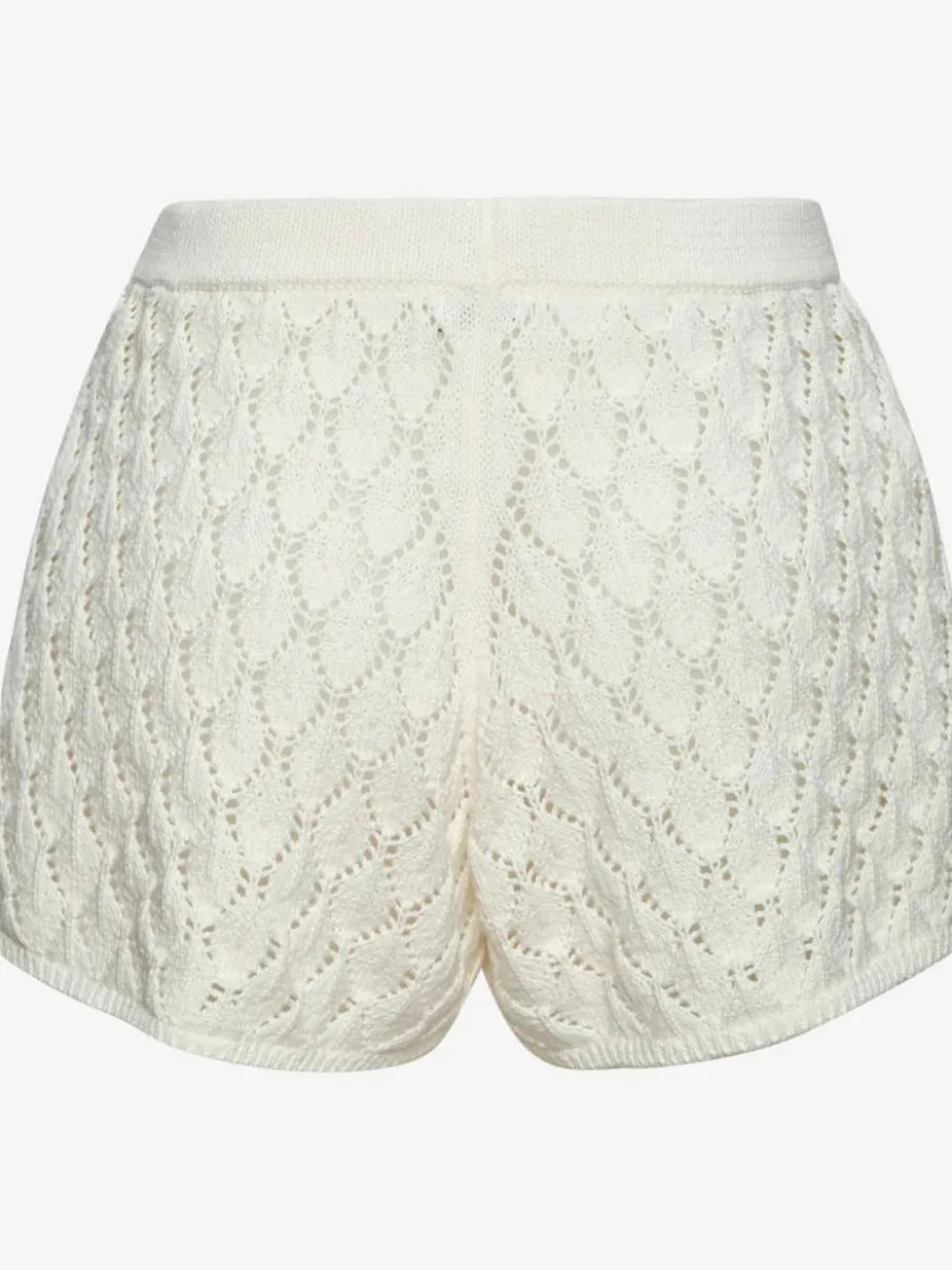 Short de plage en tricot à manches larges et motifs ajourés
