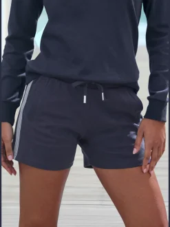 Short doux et confortable avec ceinture élastique et poches pratiques