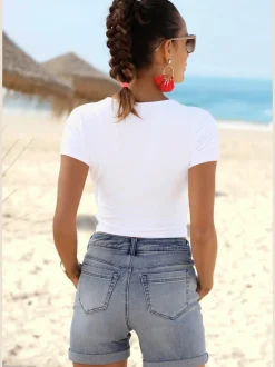Short en jean taille haute avec patte de boutonnage et revers fixe