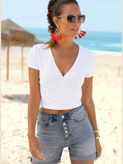 Short en jean taille haute avec patte de boutonnage et revers fixe
