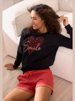 Short en matière sweat avec ceinture à coulisse et poches latérales