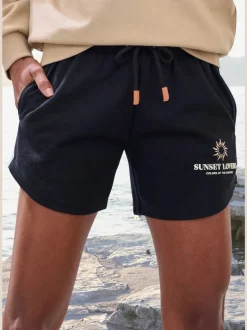 Short en matière sweat avec ceinture élastique et poches pratiques