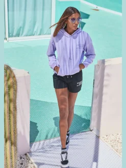 Short en matière sweat avec imprimé et poches fendues pratiques