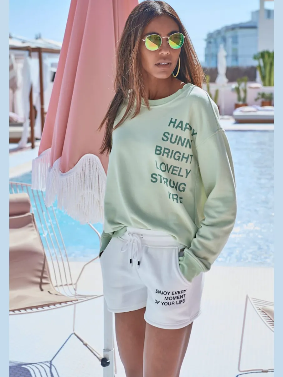 Short en matière sweat avec imprimé et poches fendues pratiques