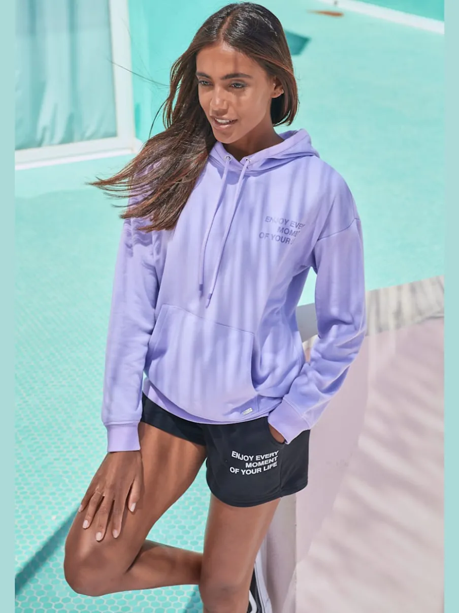Short en matière sweat avec imprimé et poches fendues pratiques
