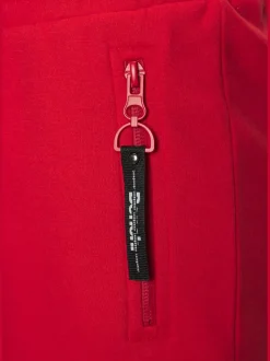 Short en matière sweat avec poches latérales zippées et ceinture élastique