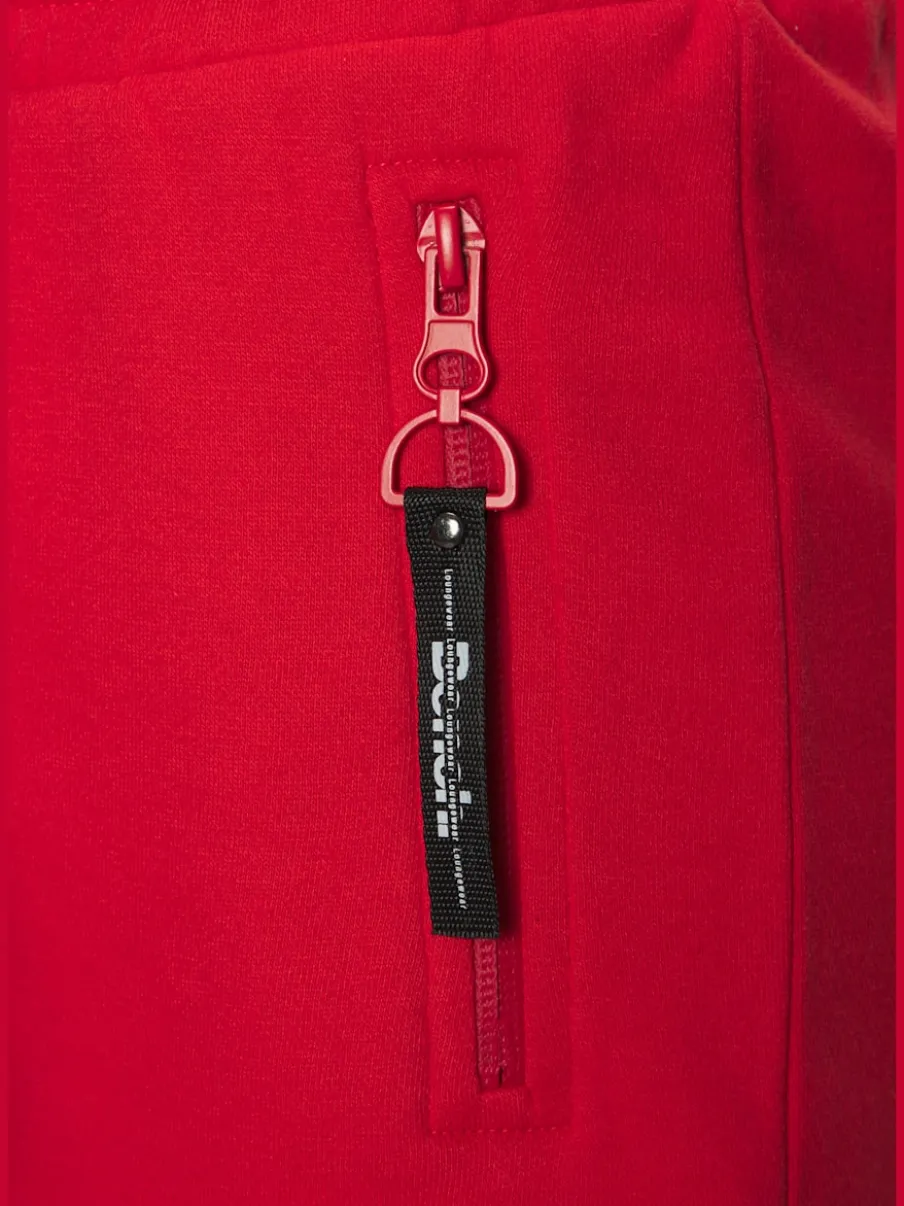 Short en matière sweat avec poches latérales zippées et ceinture élastique