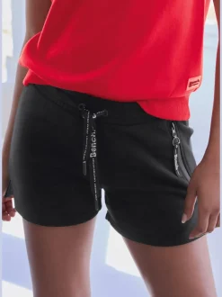 Short en matière sweat avec poches latérales zippées et ceinture élastique