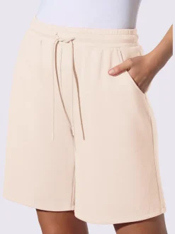 Short sweat à ceinture élastique avec poches et lien à nouer