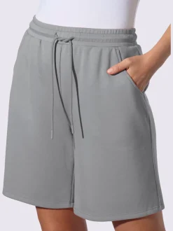 Short sweat à ceinture élastique avec poches et lien à nouer