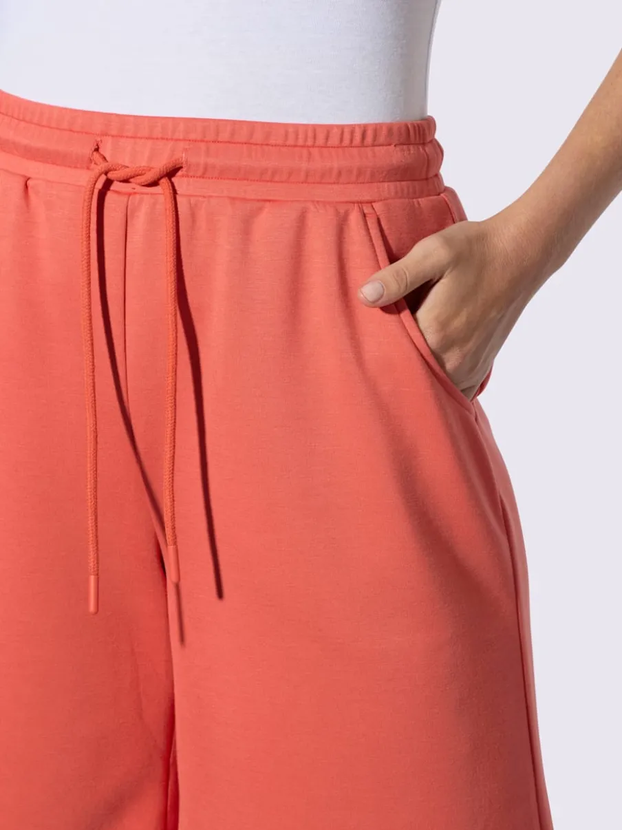 Short sweat à ceinture élastique avec poches et lien à nouer