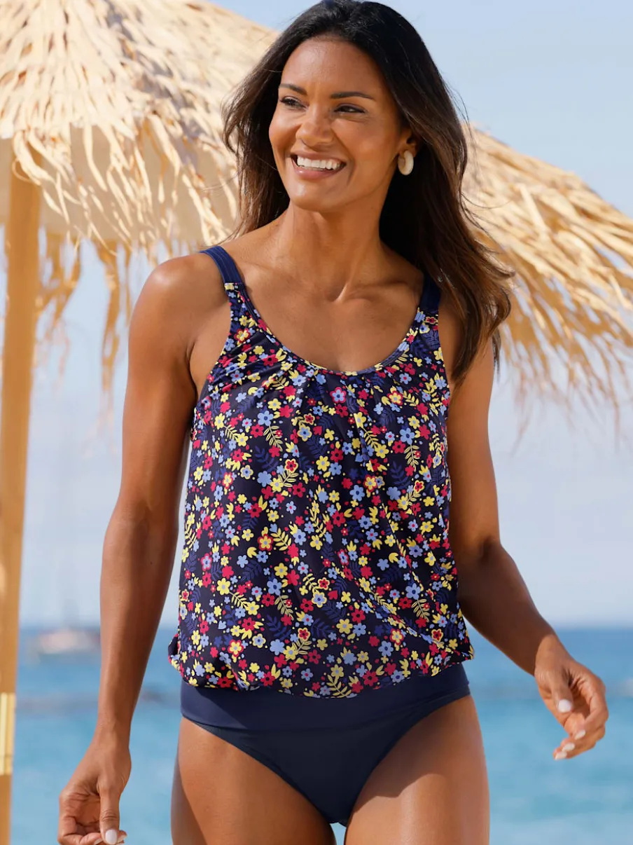 Slip bikini uni avec détails en dentelle et bretelles ajustables