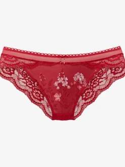 Slip féminin avec nœud décoratif fin et jolis accessoires fantaisie