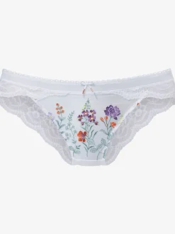 Slip féminin avec nœud décoratif fin et jolis accessoires fantaisie