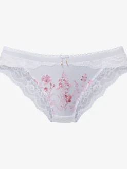 Slip féminin avec nœud décoratif fin et jolis accessoires fantaisie