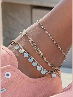Superbe chaîne de cheville multi-rangées avec pendentifs