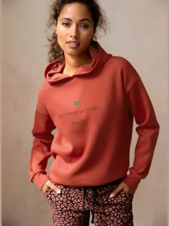 Sweat à capuche avec bords-côtes aux manches et coton doux
