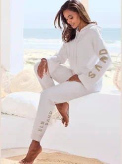 Sweat à capuche en tricot doux et élastique avec manches longues et inscriptions graphiques