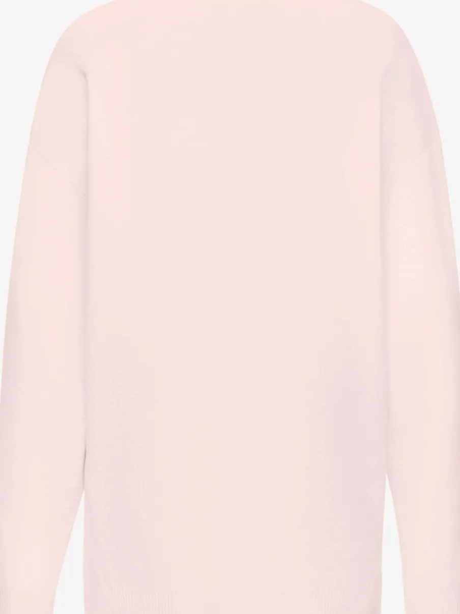 Sweater ample avec encolure en V et manches longues.