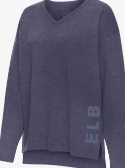 Sweater ample avec encolure en V et manches longues.