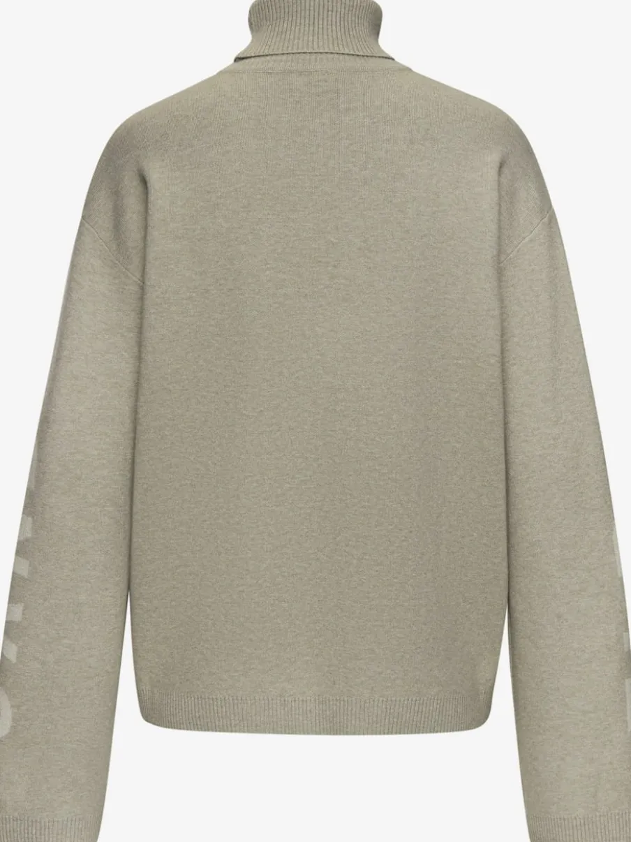 Sweater en tricot doux avec col roulé et manches longues