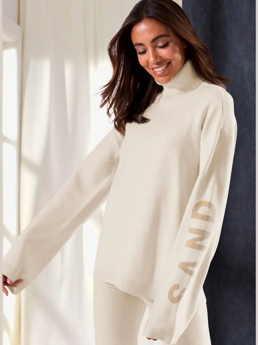 Sweater en tricot doux avec col roulé et manches longues
