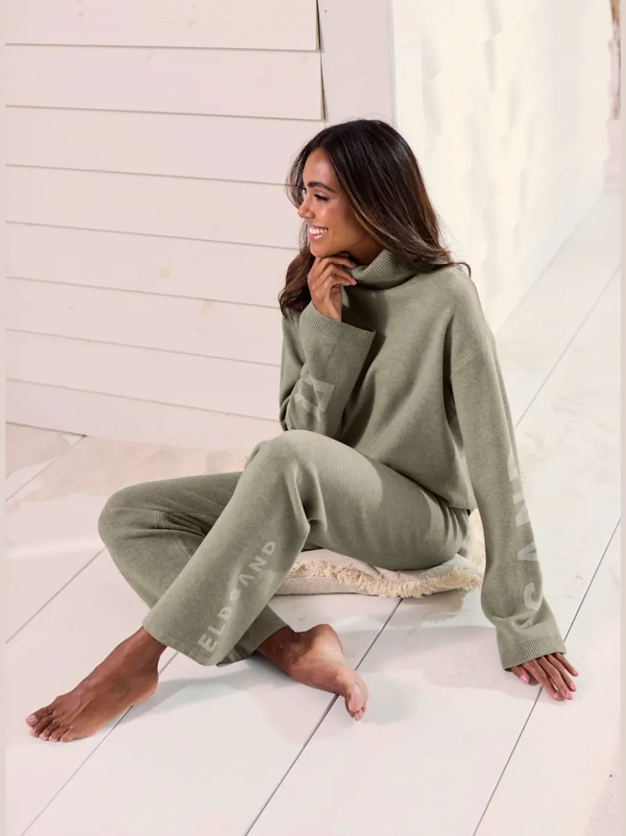 Sweater en tricot doux avec col roulé et manches longues