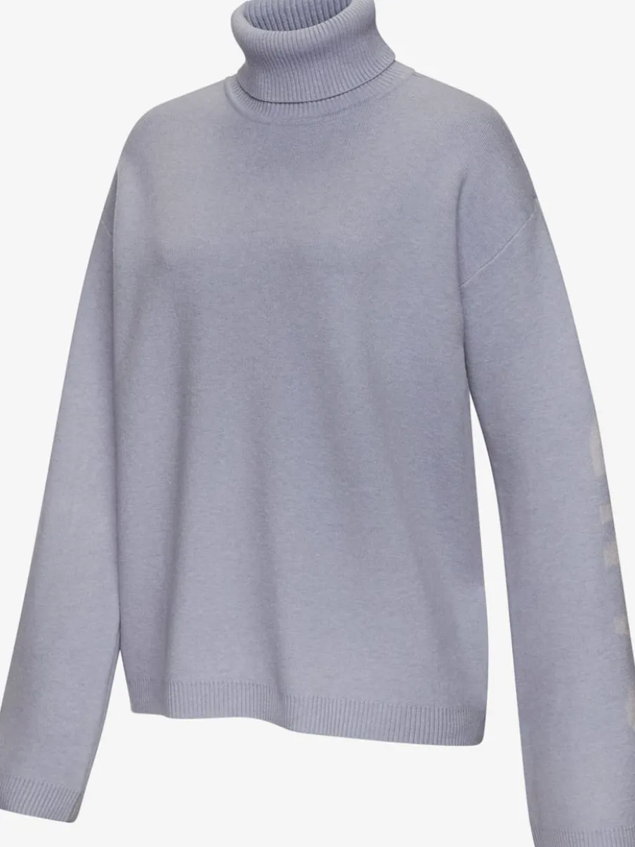 Sweater en tricot doux avec col roulé et manches longues