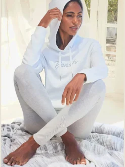 Sweatshirt à capuche avec poche kangourou et bords-côtes